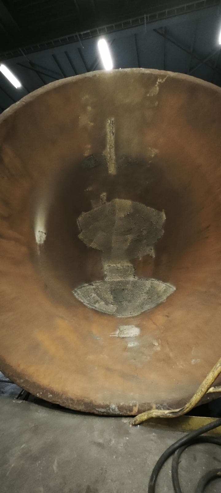 Slag pot interior with weld repair patches on the wall